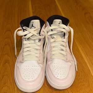 Pink and white Nike jordan 1 mid